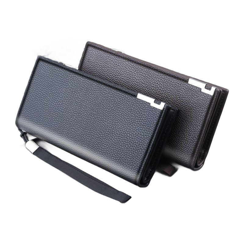 Pochette homme portefeuille long zippé à dragonne, cuir PU 2 Pochette homme portefeuille long zippé à dragonne, cuir PU, vue de trois quarts