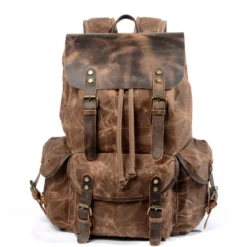 Sac à dos vintage homme en toile cirée, rabat en cuir de vachette, vue principale