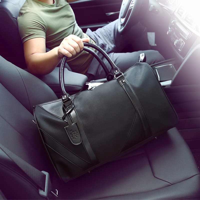 Sac polochon homme noir, deux tailles, anses et bandoulière 3 Sac polochon homme noir, deux tailles, anses et bandoulière, vue de face