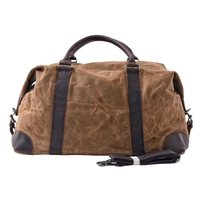 Sac week end homme en toile cirée, anses et coins en cuir 1 Sac week end homme en toile cirée, anses et coins en cuir, vue principale