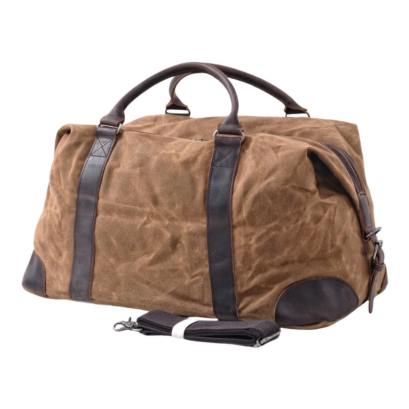 Sac week end homme en toile cirée, anses et coins en cuir 2 Sac week end homme en toile cirée, anses et coins en cuir, vue de trois quarts