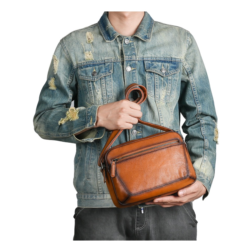 Sacoche homme cuir véritable rétro à poche avant zippée 3 Sacoche homme cuir véritable rétro à poche avant zippée, vue de face