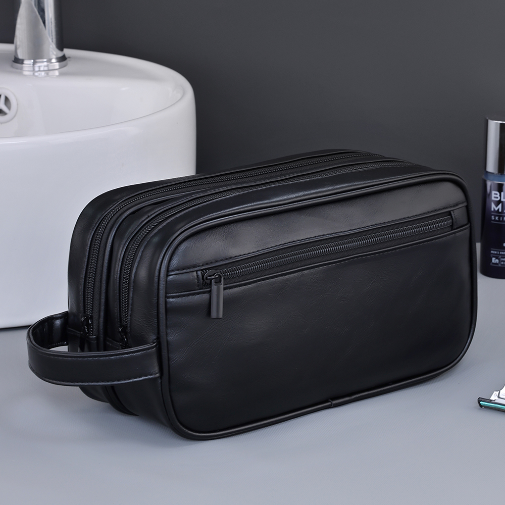 Trousse de toilette homme double compartiment en cuir PU 2 Trousse de toilette homme double compartiment en cuir PU, vue de trois quarts